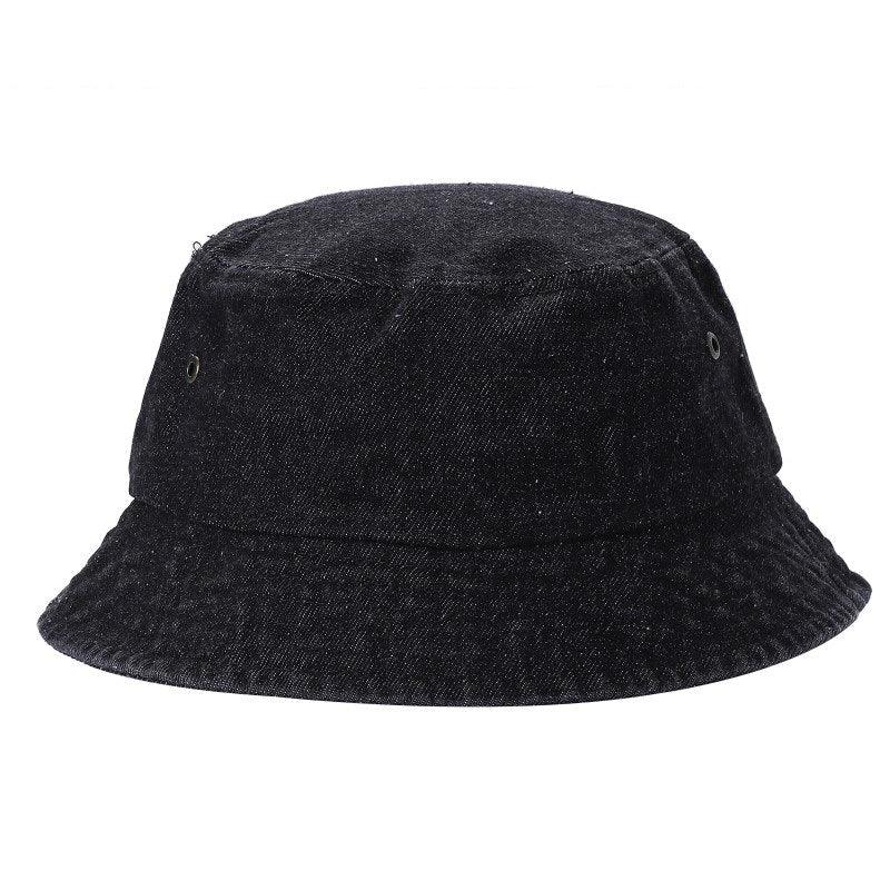 Black denim bucket hat with grommet eyelets, wholesale headwear on white background