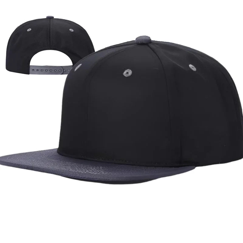 A black Tencel snapback cap with a flat brim and adjustable snapback closure, displayed from two angles.