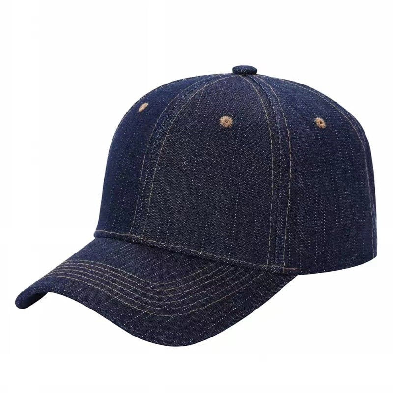Waycap V1 dark wash denim baseball cap with adjustable Velcro closure and tan stitching.