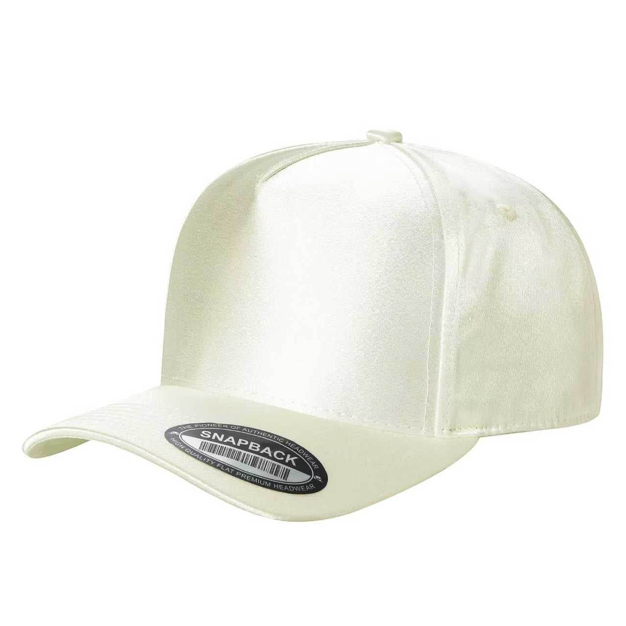 Waycap INC cream satin snapback cap with a contrasting suede bill and adjustable strap. Classic baseball hat style.
