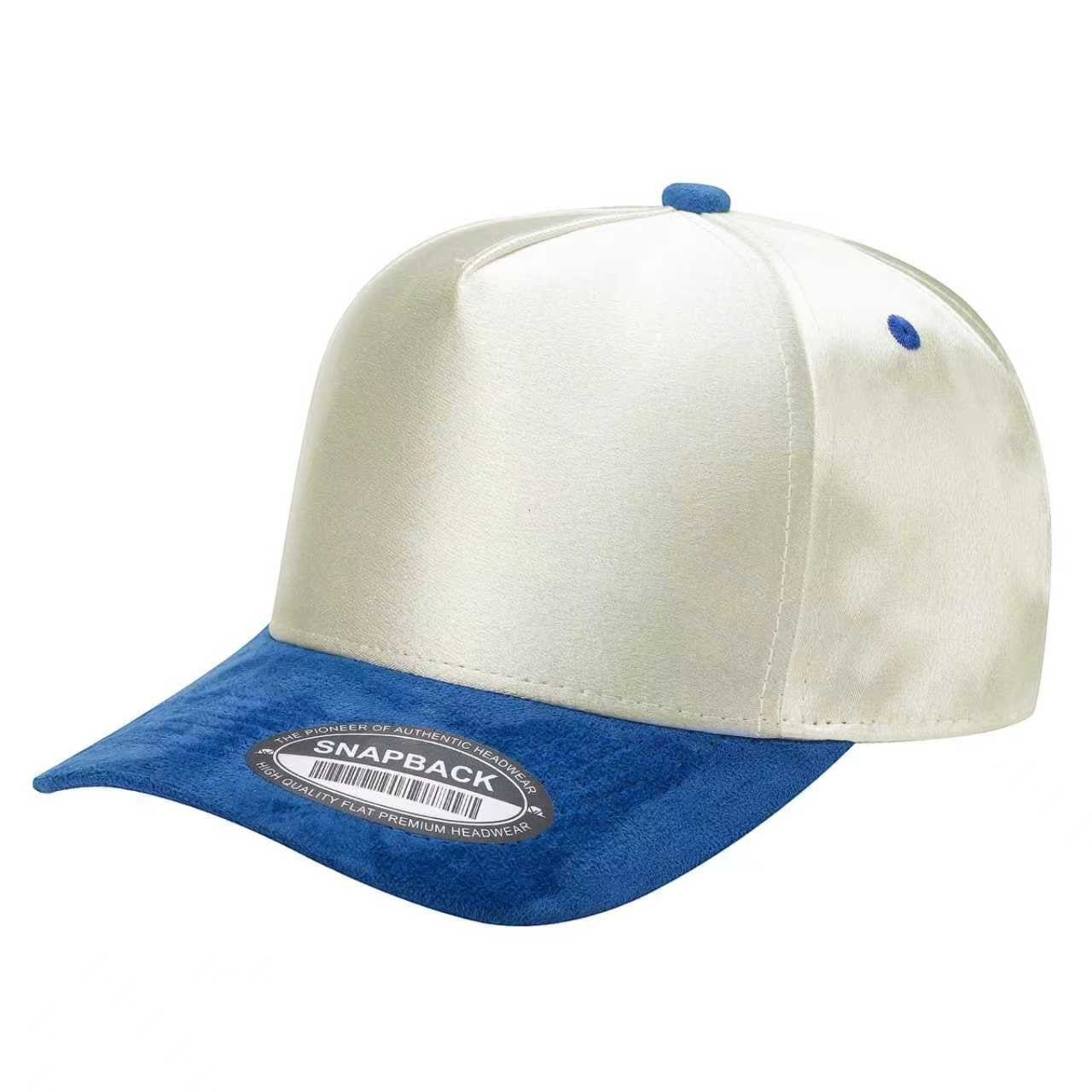 Waycap INC cream satin snapback cap with royal blue suede bill and matching button detail. Adjustable fit.